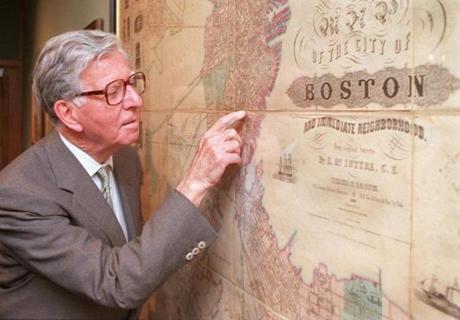 Norman Leventhal looked at streets on an old map of Boston on display at MIT.  
